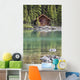 Wooden Cabin Along A Lake Shore Wall Mural