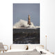 Waves Crashing Against A Lighthouse Wall Mural