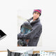 A Boy With A Snowboard Wall Mural