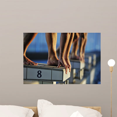 Swimming Start Wall Mural shown on a wall