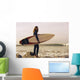 Young Woman With Her Surfboard At The Beach Wall Mural