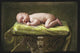 A Baby Asleep On A Pillar Wall Mural