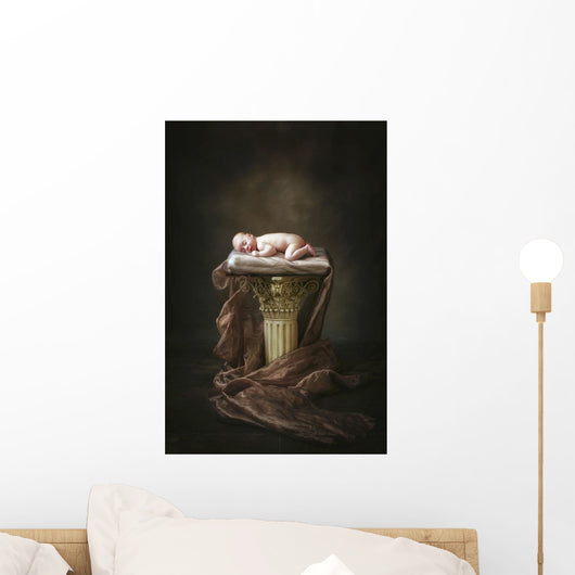A Baby Asleep On A Pillar Wall Mural