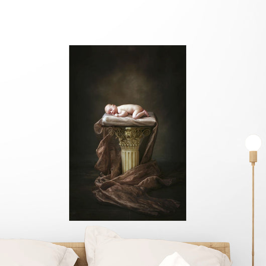 A Baby Asleep On A Pillar Wall Mural