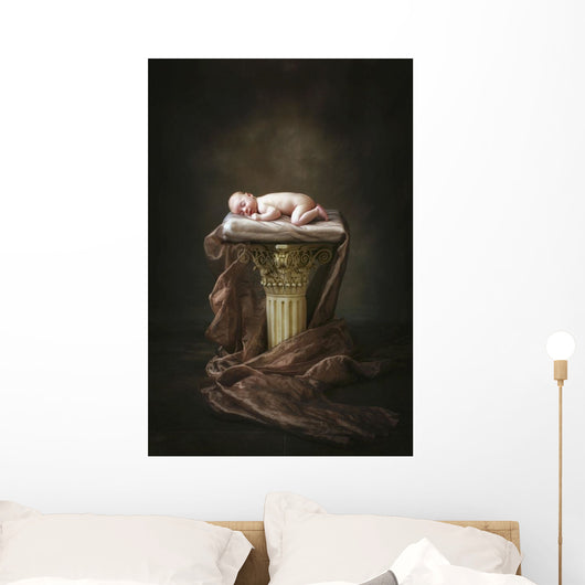 A Baby Asleep On A Pillar Wall Mural
