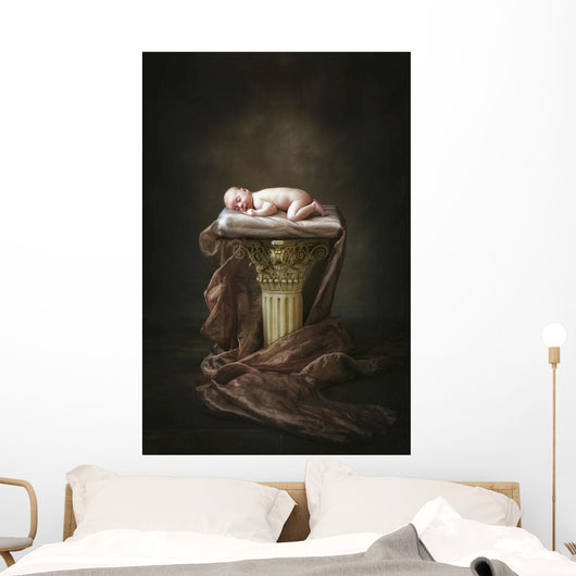 A Baby Asleep On A Pillar Wall Mural