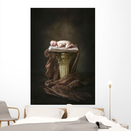 A Baby Asleep On A Pillar Wall Mural