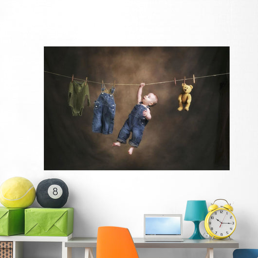 A Baby On The Clothesline Wall Mural