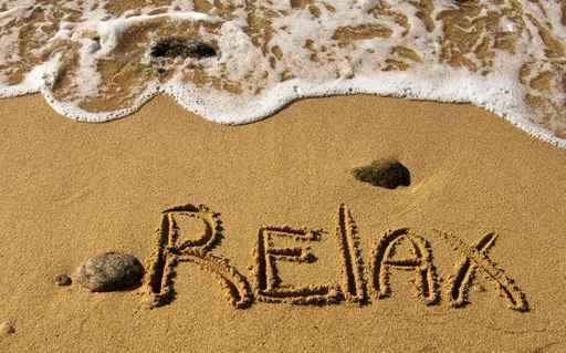 Relax Inscription Sand near Wall Mural