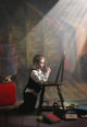 A Young Boy Praying With A Light Beam On Him Wall Mural