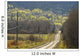 A Country Road With Electrical Wires Running Along It Wall Mural