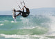A Man Kitesurfing Off Dos Mares Beach In Front Of Hotel Dos Mares Wall Mural