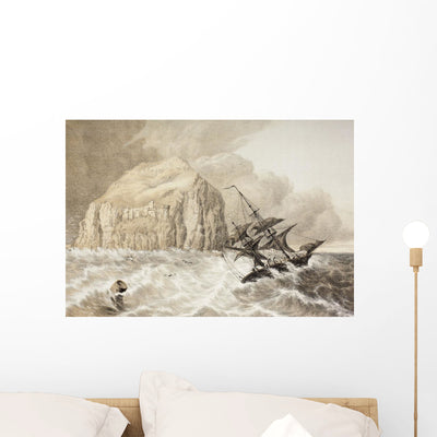 Shipwreck against Bass Rock Wall Mural shown on a wall