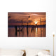Silhouette Of Seagulls On Posts In Sea At Sunset Wall Mural