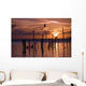Silhouette Of Seagulls On Posts In Sea At Sunset Wall Mural