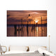 Silhouette Of Seagulls On Posts In Sea At Sunset Wall Mural