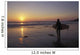 Silhouetted Surfer On Sandy Beach At Sunset Wall Mural