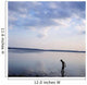 Boy In Silhouette Wading In Ocean Wall Mural