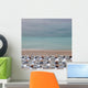 Deck Chairs On Empty Beach Wall Mural