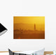 Tower Silhouetted Amongst Orange Mountains Wall Mural