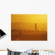 Tower Silhouetted Amongst Orange Mountains Wall Mural
