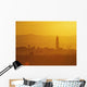 Tower Silhouetted Amongst Orange Mountains Wall Mural
