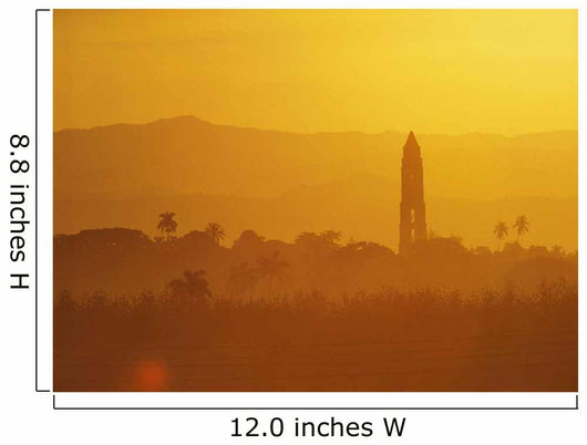 Tower Silhouetted Amongst Orange Mountains Wall Mural