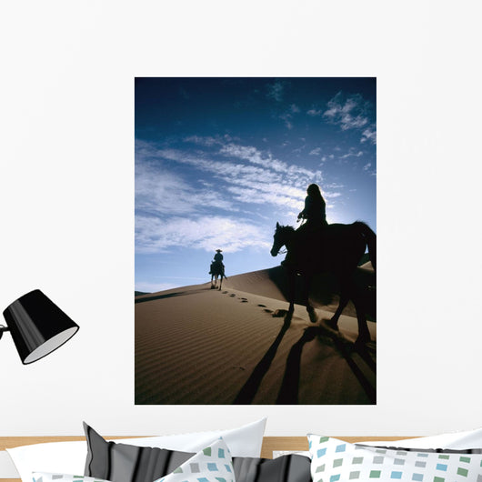Horseback Riders In Silhouette On Sand Dune Wall Mural