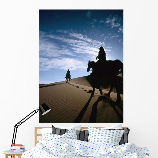 Horseback Riders In Silhouette On Sand Dune Wall Mural