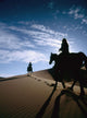 Horseback Riders In Silhouette On Sand Dune Wall Mural