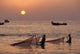 Fishermen Holding Nets In Sea At Sunset Wall Mural