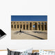 Man Walking Past Shadow Of Date Palm In Forecourt Wall Mural