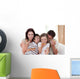Happy family eating pizza Wall Mural