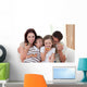 Happy family eating pizza Wall Mural