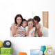 Happy family eating pizza Wall Mural