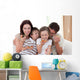 Happy family eating pizza Wall Mural