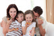 Happy family eating pizza Wall Mural