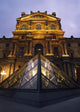 Small Glass Pyramid Outside The Louvre Museum At Dusk Wall Mural
