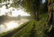 Looking Along The Nantes-Brest Canal On A Misty Morning Wall Mural
