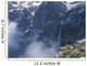 Walker Looking Over Waterfall At Cirque De Gavarnie Wall Mural