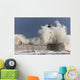 Waves Crashing Up Against A Lighthouse Wall Mural