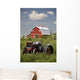 Old Red Tractor In A Field With A Red Barn In The Background Wall Mural