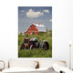 Old Red Tractor In A Field With A Red Barn In The Background Wall Mural
