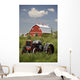 Old Red Tractor In A Field With A Red Barn In The Background Wall Mural