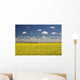 Flowering Canola Field With Clouds Overhead Wall Mural