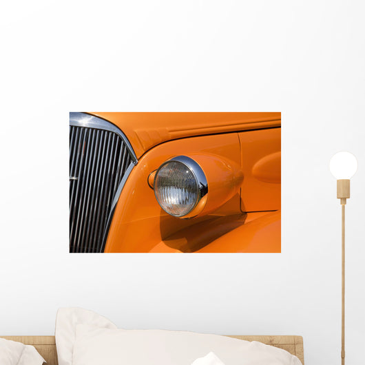 Orange Painted Vintage Car's Headlight And Front Grill Wall Mural