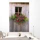 Wooden Shed With A Flower Box Under The Window Wall Mural