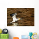 Gannet Flying Away From Water Level Wall Mural