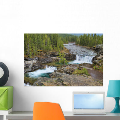 Waterfall Canadian Rocky Mountains Wall Mural shown on a wall