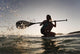 A Woman Paddling While Wall Mural